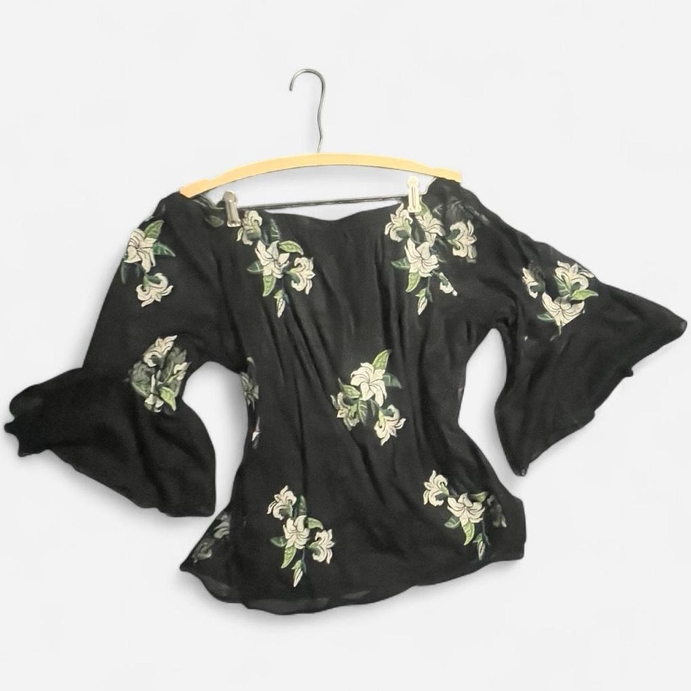 Black floral off the shoulder top with bell sleeves